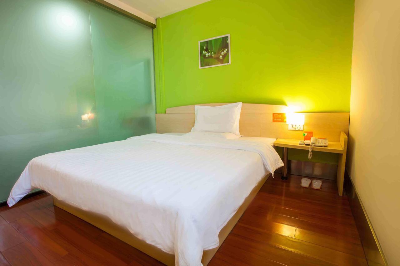 7 Days Inn Yangjiang Xinyue International Studio Habitación foto