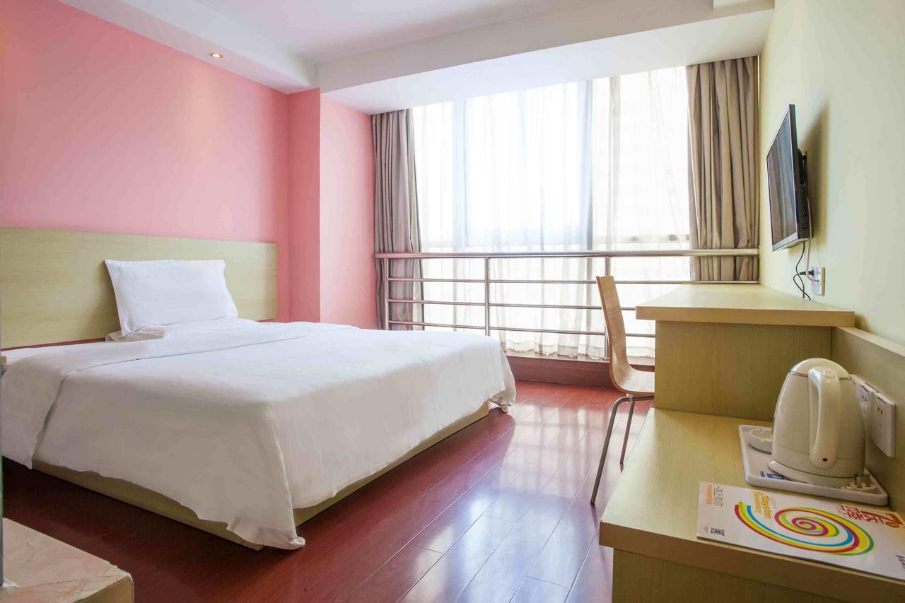 7 Days Inn Yangjiang Xinyue International Studio Habitación foto