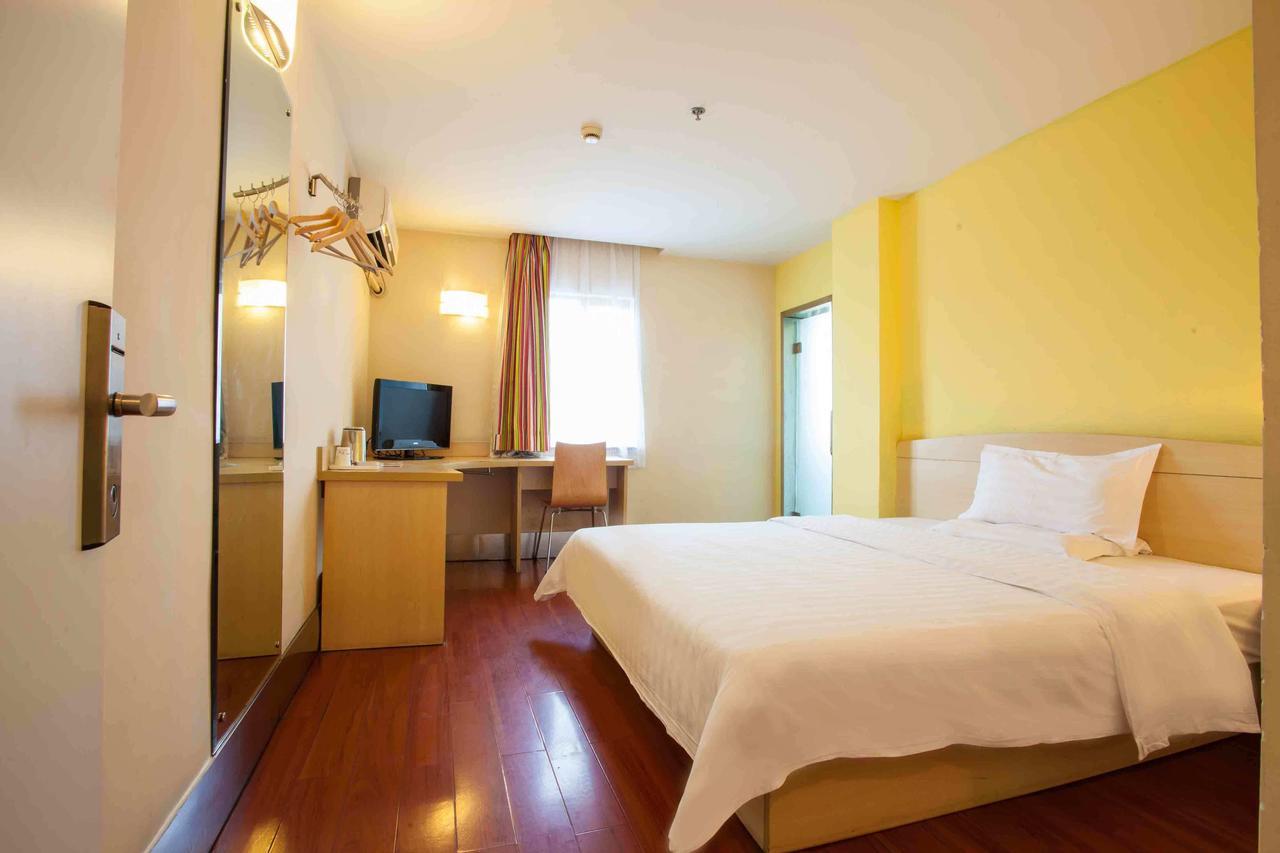 7 Days Inn Yangjiang Xinyue International Studio Habitación foto