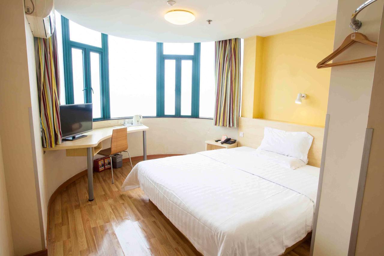7 Days Inn Yangjiang Xinyue International Studio Habitación foto