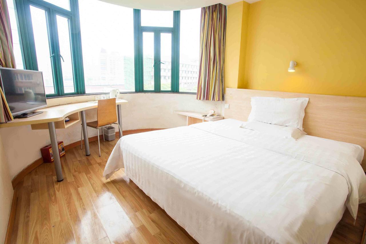 7 Days Inn Yangjiang Xinyue International Studio Habitación foto