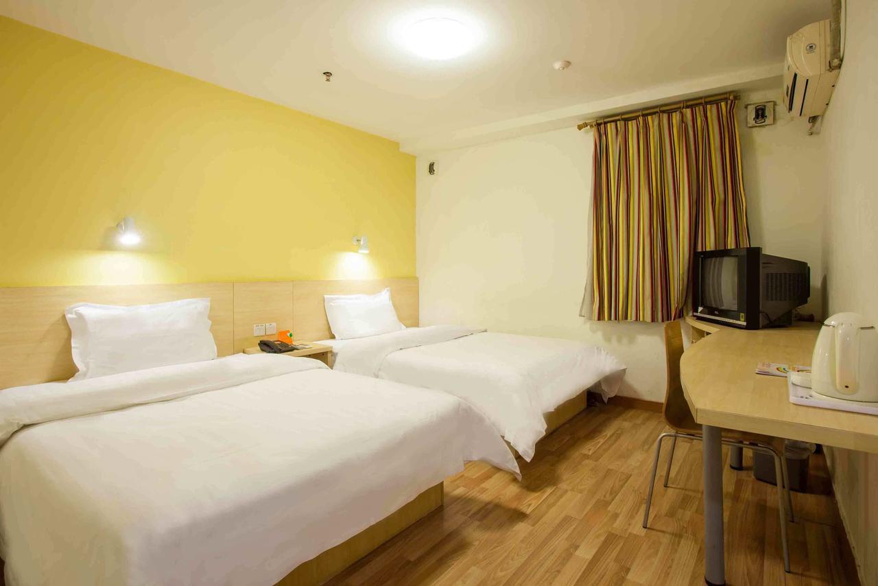 7 Days Inn Yangjiang Xinyue International Studio Habitación foto