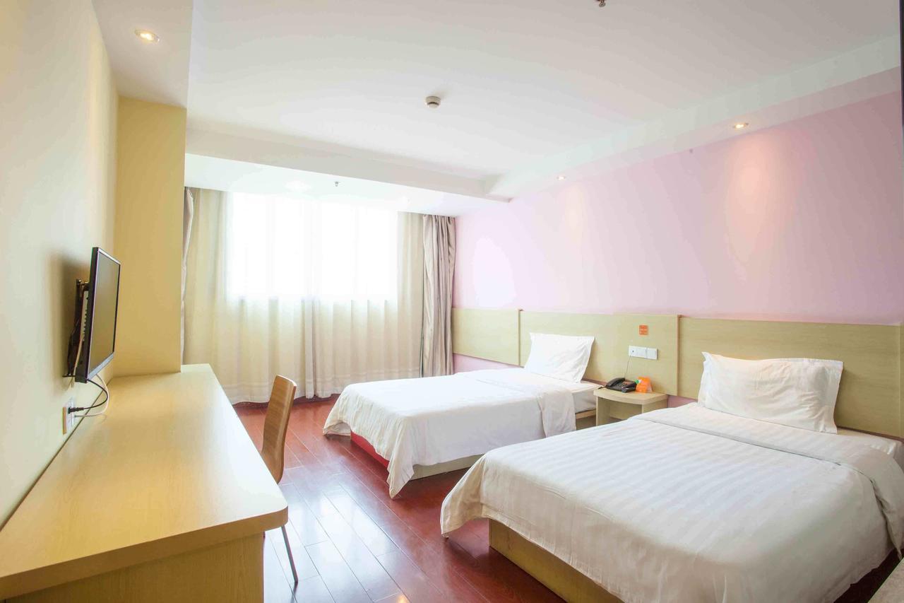 7 Days Inn Yangjiang Xinyue International Studio Habitación foto